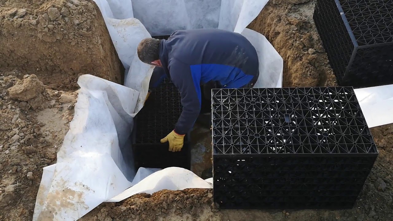 Soakaway installation in Haringey with excavator and operator